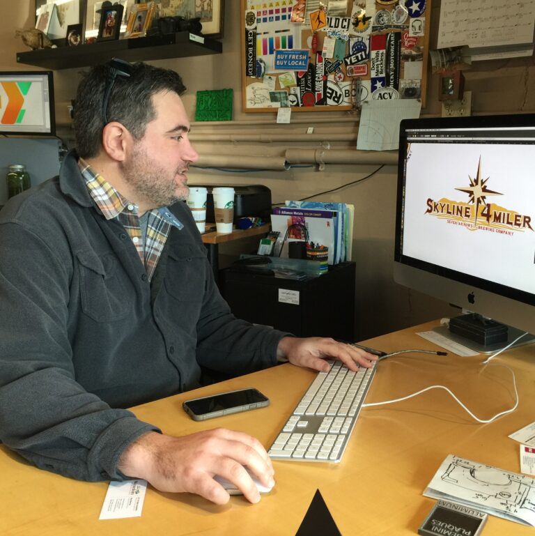 Local Graphic Designer Holding the Key